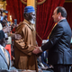 French President Francois Hollande (C-R)shakes hands with veterans during a ceremony to award French citizenship to former Senegalese riflemen veterans at the Elysee Palace in Paris, France, 15 April 2017.